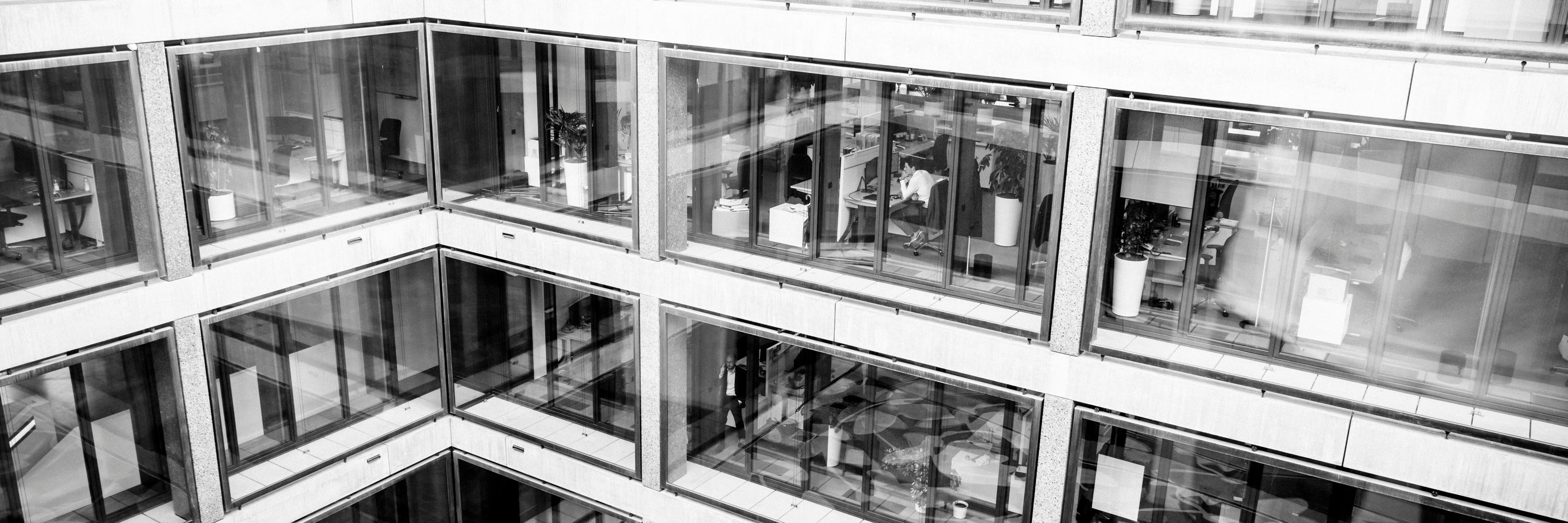 Climate-focused Investment Management Munich Re Building people sitting in the office
